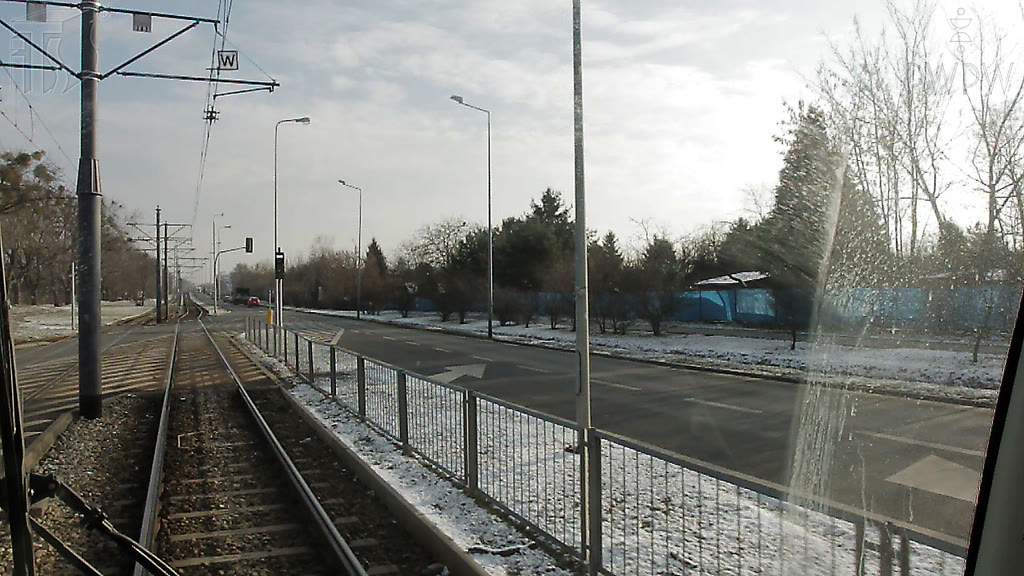 Question illustration: Does the sign on the overhead wire indicate that you are approaching a junction with a change induced signalling device?
