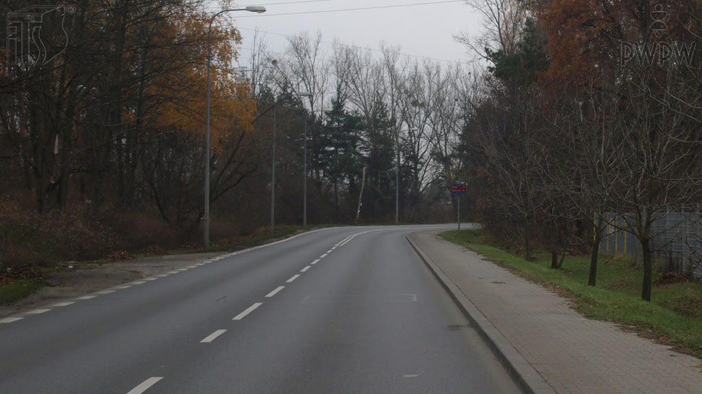 Question illustration: What should you do while riding a moped, immediately before you enter a sharp bend?