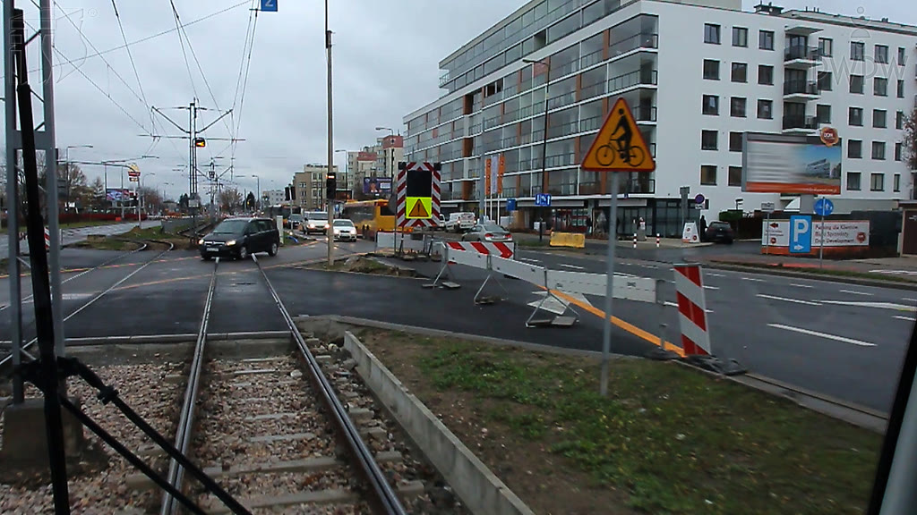 Question illustration: Should you expect bicycle traffic beyond the warning sign visible in the foreground?