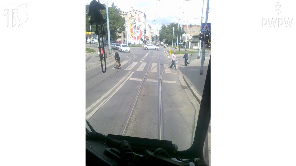 Question illustration: In this situation, do you have the right to continue driving provided you yield the right of way to pedestrians?
