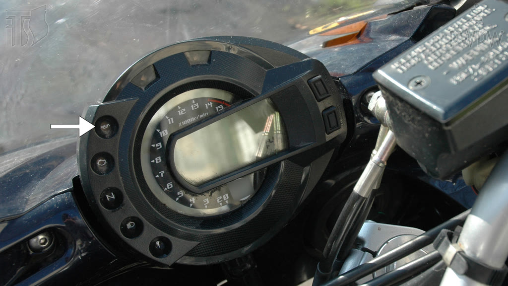 Question illustration: What should you do if the oil pressure control light comes on while you're riding a motorcycle?