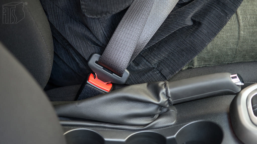 Question illustration: In which situation will a fastened safety belt not function properly:
