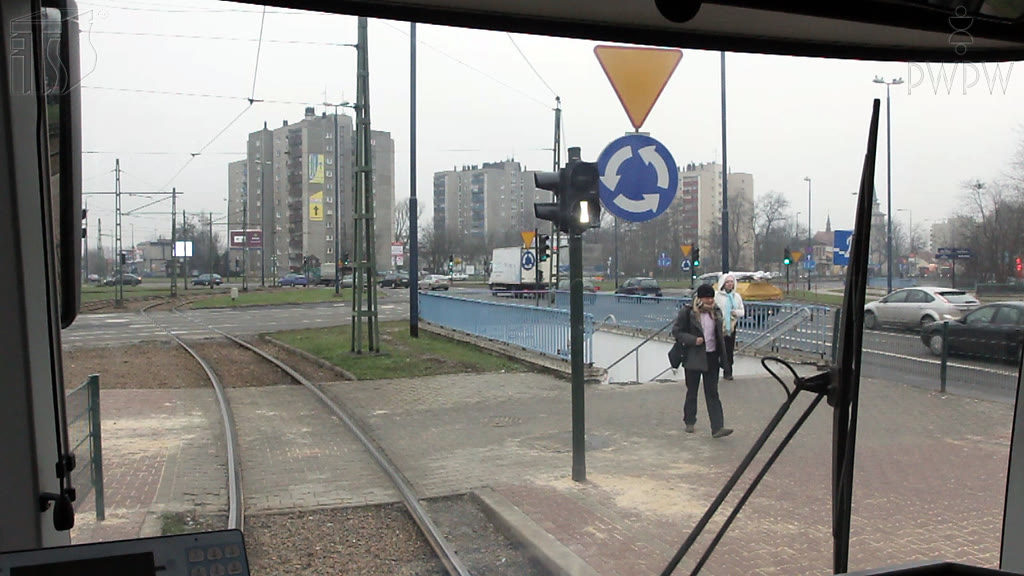 Question illustration: Do light signal have priority over road signs governing the right of way?