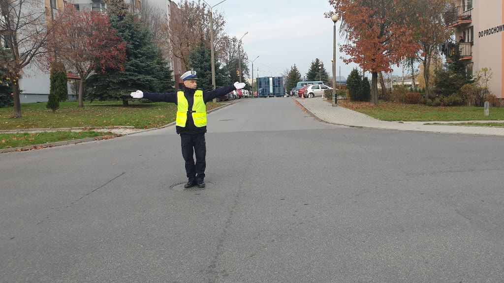 Question illustration: Can you drive into the intersection when you see a policeman standing on it facing you?