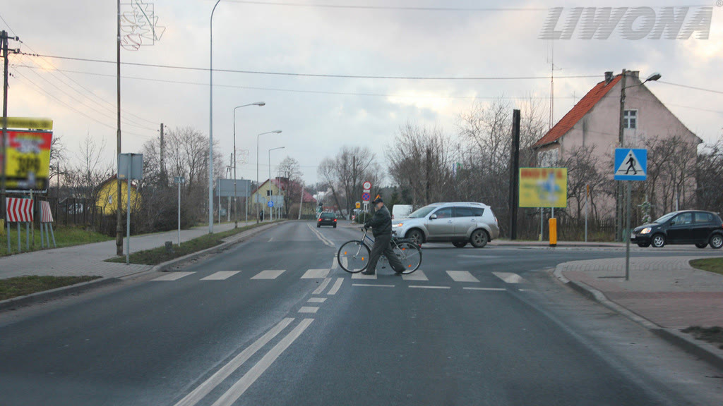 Question illustration: In this situation, should you allow a pedestrian to freely exit the pedestrian crossing?