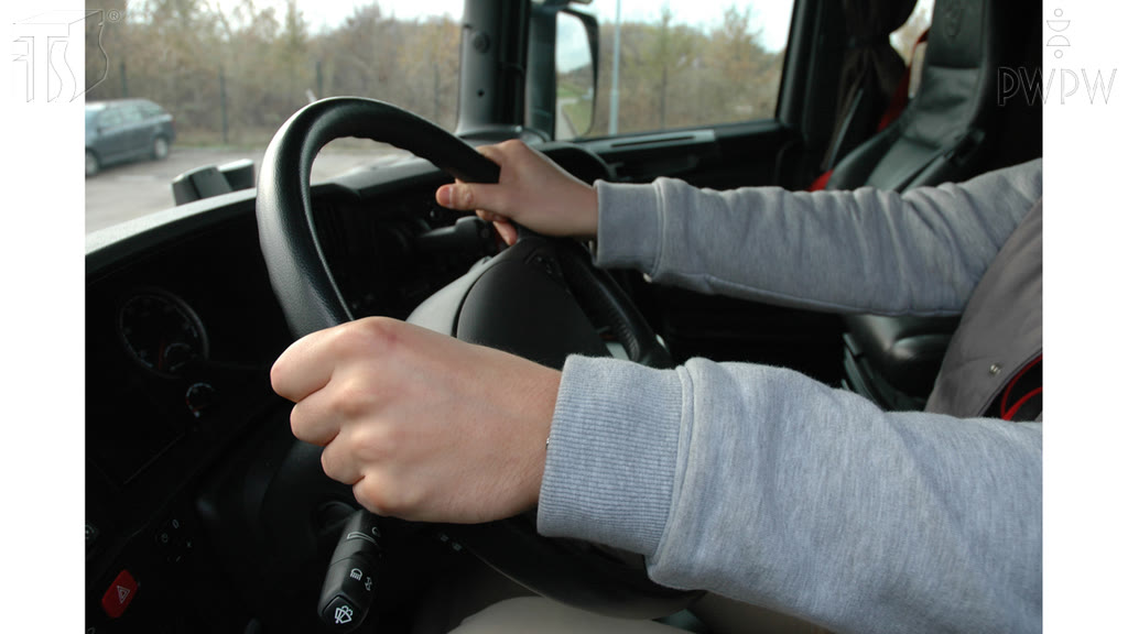 Question illustration: What is the maximum front overhang of a load transported in a motor vehicle, counting from the driver's seat?
