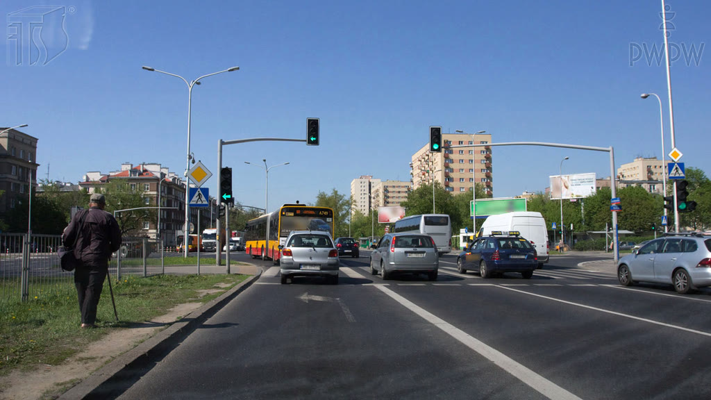 Question illustration: Does the light signal for you lane allow for making a U-turn in this situation?