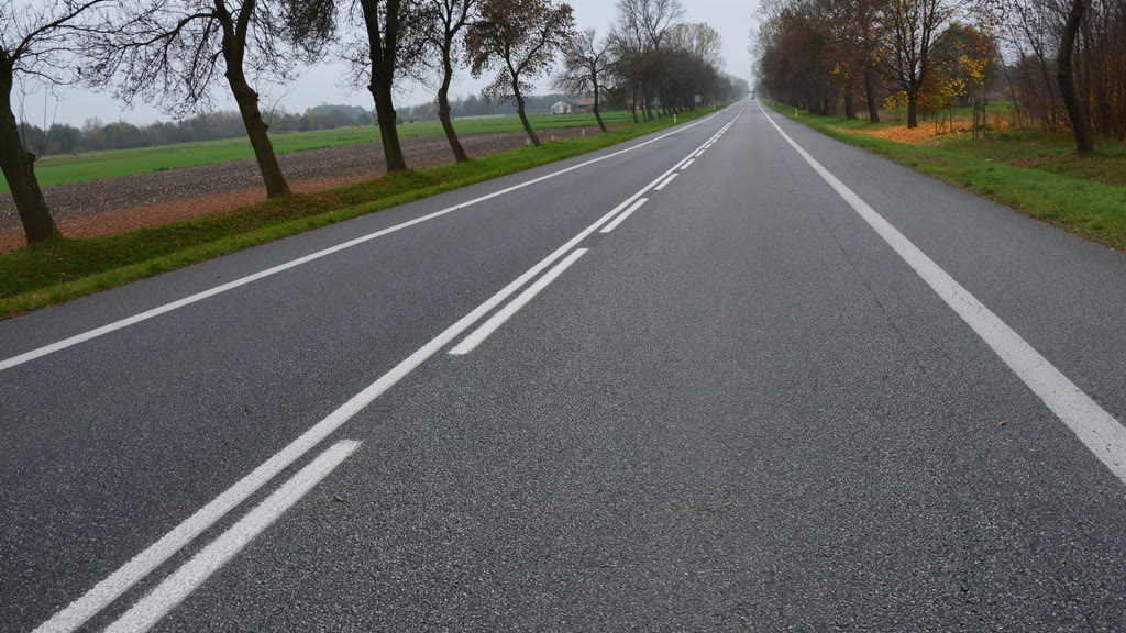 Question illustration: The visible line separating traffic lanes is a line that can be crossed by drivers travelling in the opposite direction.