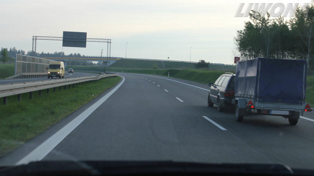 Question illustration: How should you transport cargo in a trailer pulled by a passenger car?