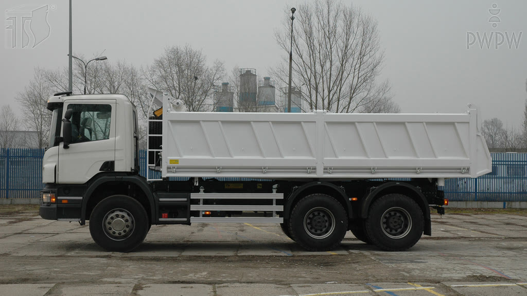 Question illustration: How should a load be placed in a truck?