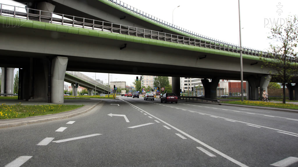 Question illustration: Are you allowed in this place to change the lane if you intend to drive straight on?