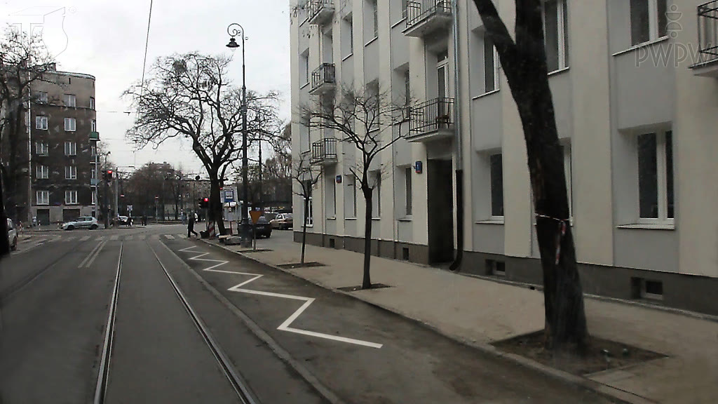 Question illustration: Does the visible broken line on the road indicate a parking place for the disabled?