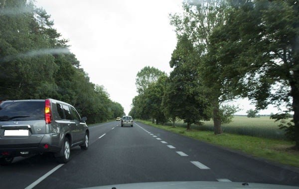 Question illustration: You are driving a vehicle that is being overtaken. In this situation, are you prohibited from increasing your speed?