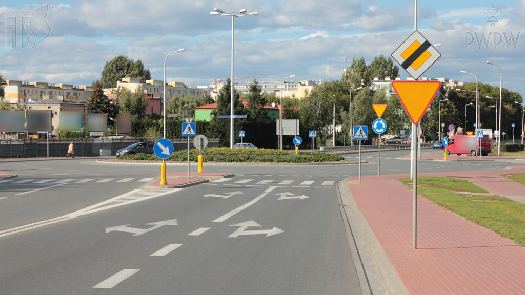 Question illustration: While driving a bus, how will you turn right at the intersection?