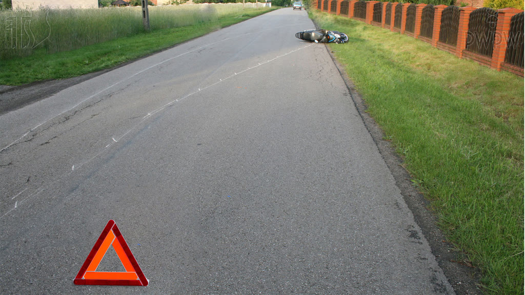 Question illustration: When riding a motorcycle you participate in a road accident in with a person got injured. Do you need to abide by the prohibition to remove the vehicle from the scene of the accident?