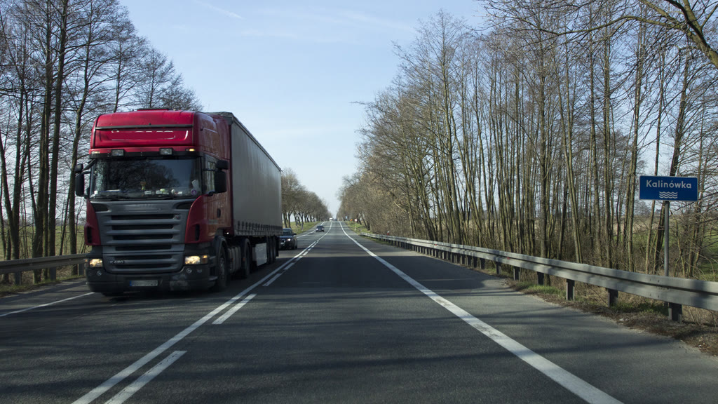 Question illustration: Do you have to keep a safe distance from the vehicle you are passing?