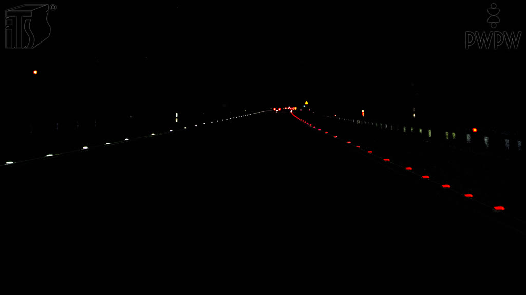 Question illustration: In the presented situation, is there a lane behind the line composed of red reflective road studs?