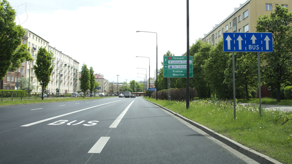 Question illustration: You are driving a bus carrying passengers free of charge. Are you allowed in this situation to drive onto the lane marked with the "BUS" sign?