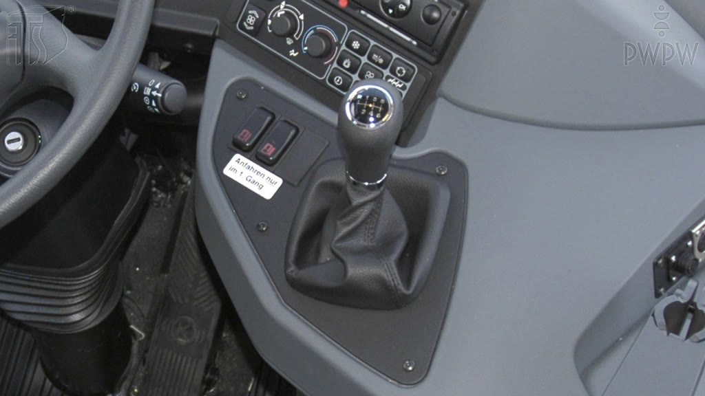 Question illustration: In which gear will a bus start moving forward in good road conditions, on a flat surface?