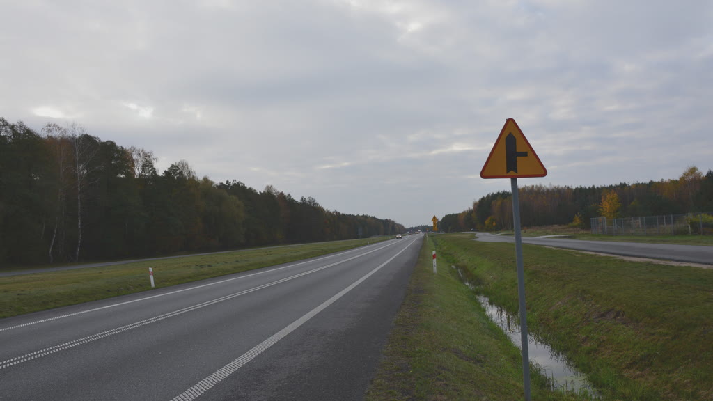 Question illustration: Do you have the right of way at the nearest intersection over the vehicle approaching from the right?