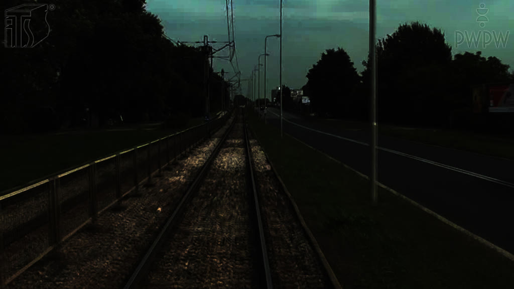 Question illustration: When driving a tram from dusk to down on an unlit road in a built-up area, are you allowed to use the high beam lights?