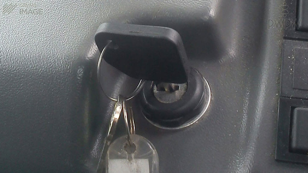 Question illustration: In which of the following situations should you not start the engine in an agricultural tractor?