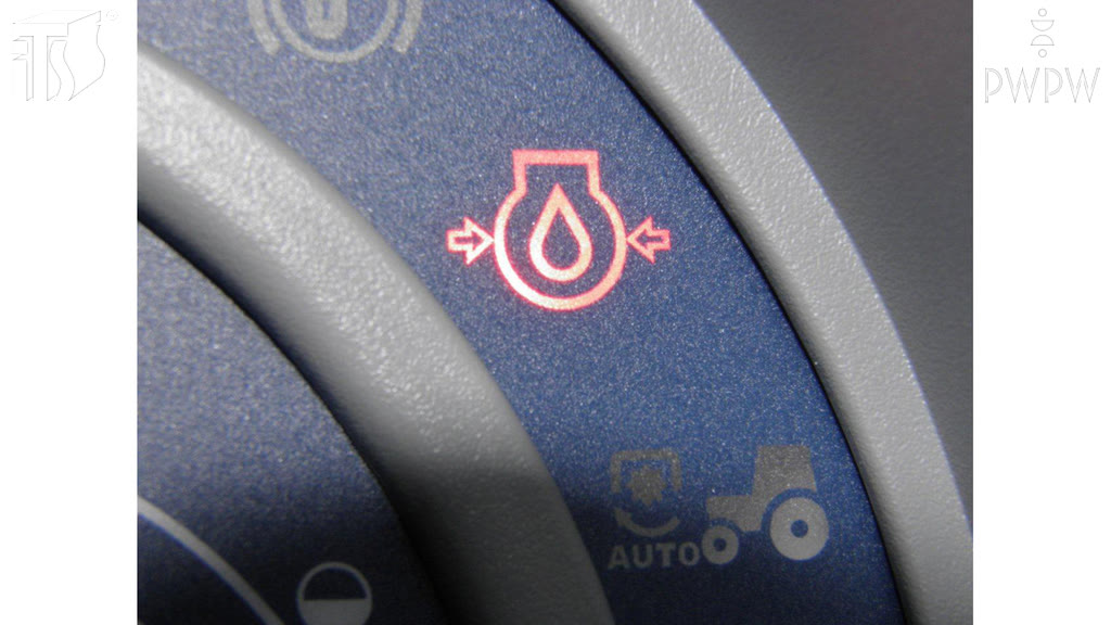 Question illustration: What does it indicate when the engine lubrication control light comes on?