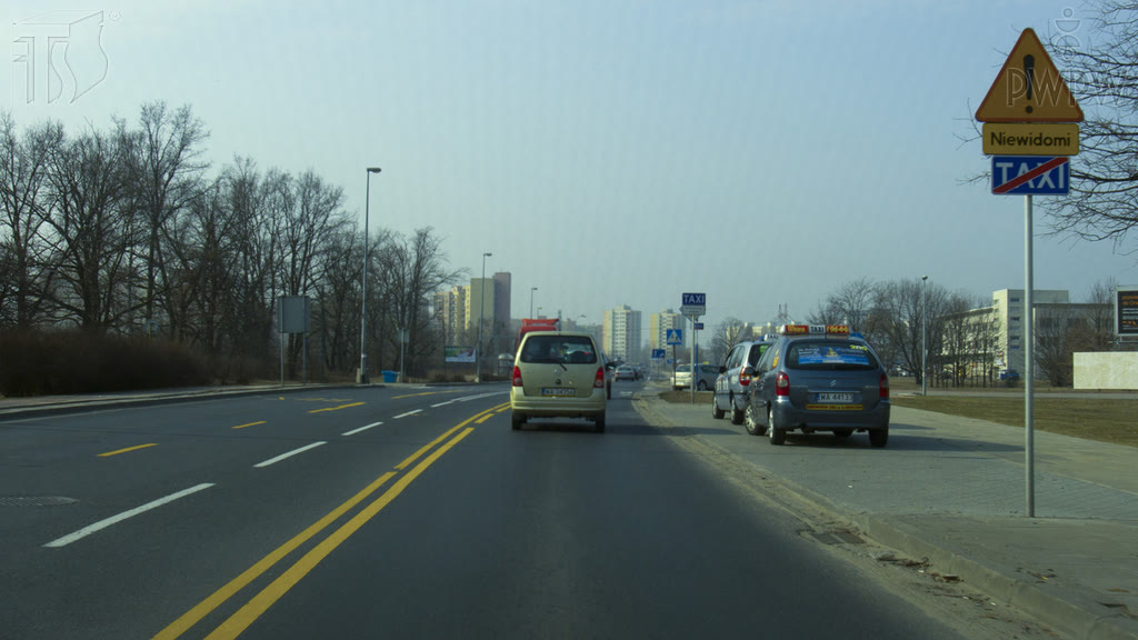 Question illustration: Are you allowed in this situation to use all lanes along the entire width of the roadway?