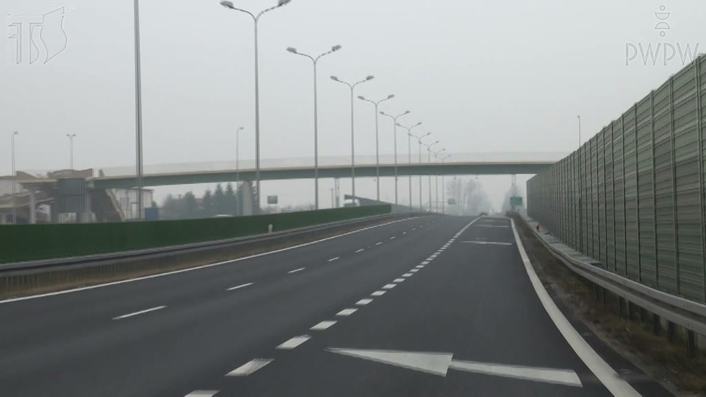 Question illustration: Do the visible road markings in the right lane indicate the start of an exit from the motorway?