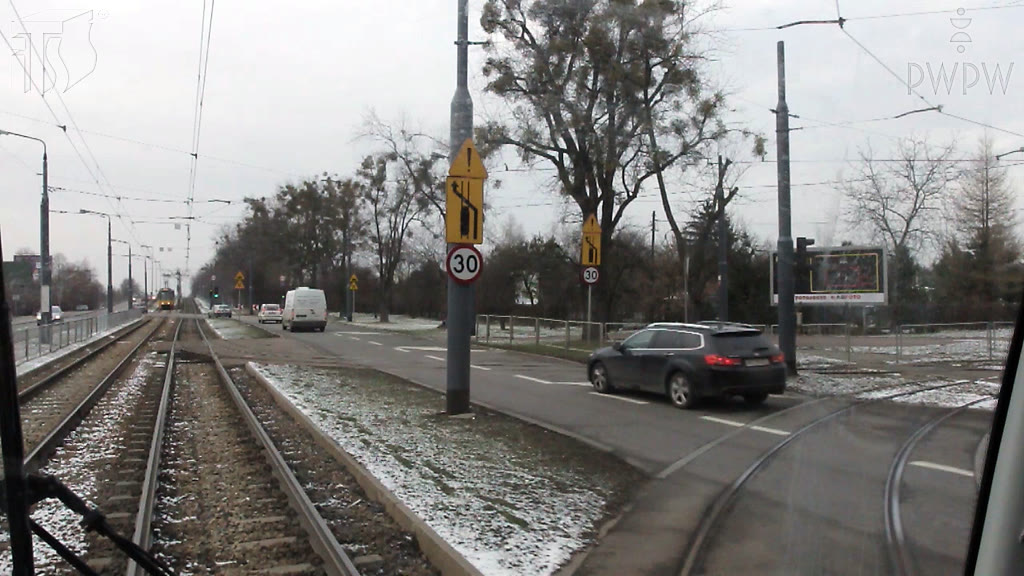 Question illustration: Upon seeing this warning sign, should the tram driver expect vehicles entering on to the track?