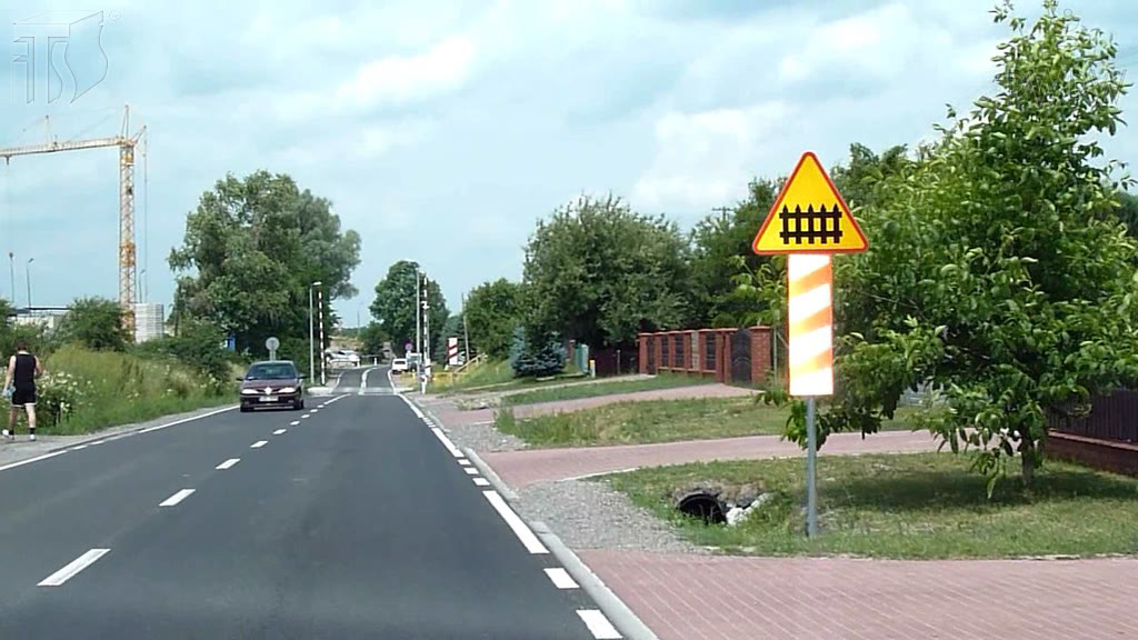 Question illustration: Do you always have to stop before you enter a railway crossing marked with this sign?