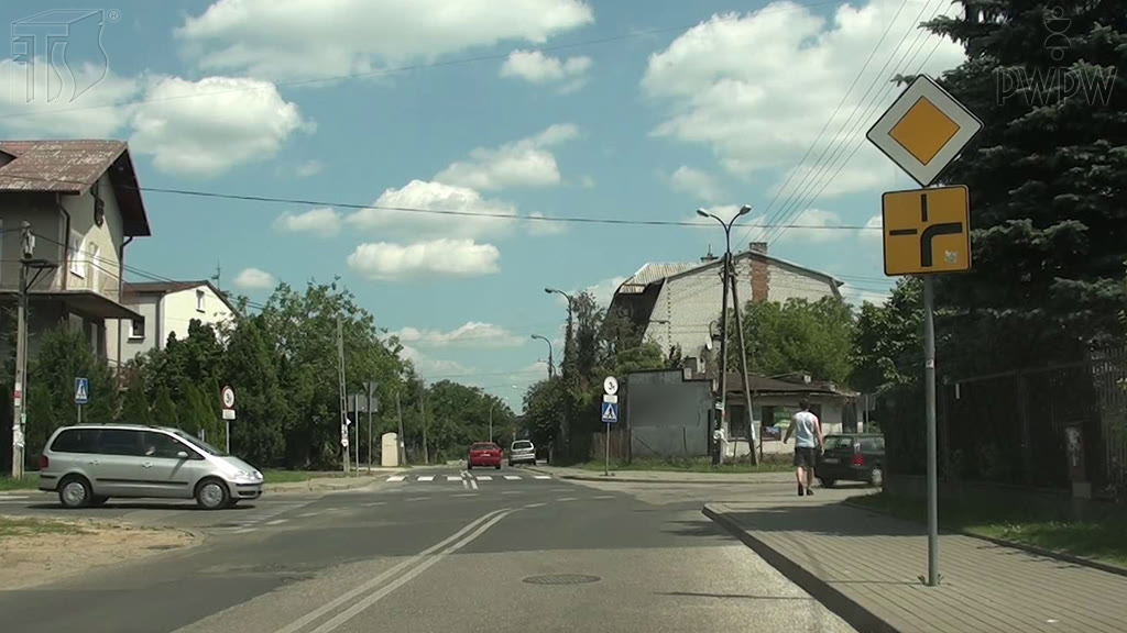 Question illustration: If you go straight at this intersection, do you have the right of way over a vehicle approaching from the left?