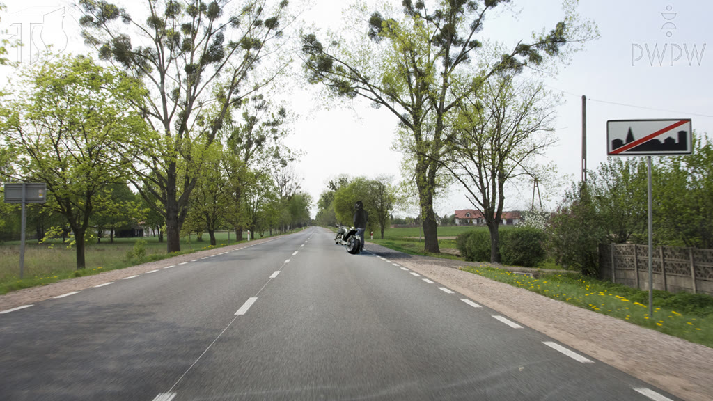 Question illustration: Should you move the motorcycle which broke down onto the hard shoulder in this situation?